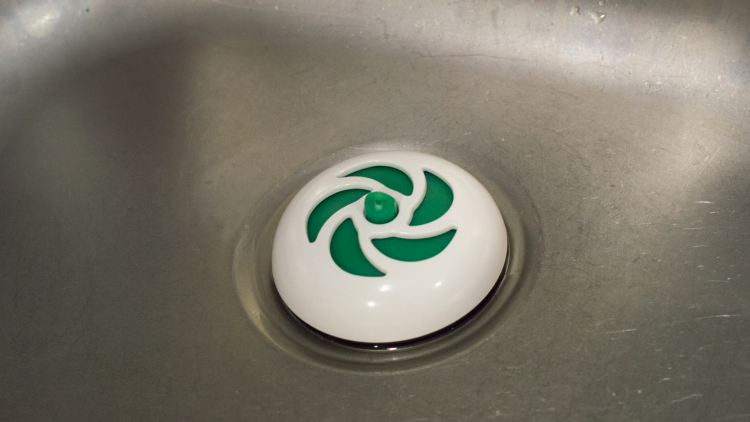 A replacement plug which prevents baths and sinks from flooding