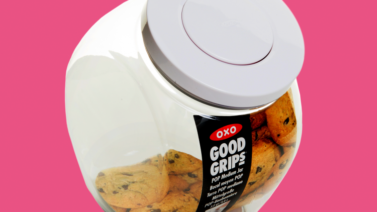A transparent food storage container with an easy to open lid
