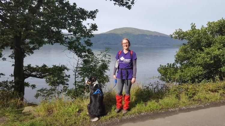 women with dog hiking