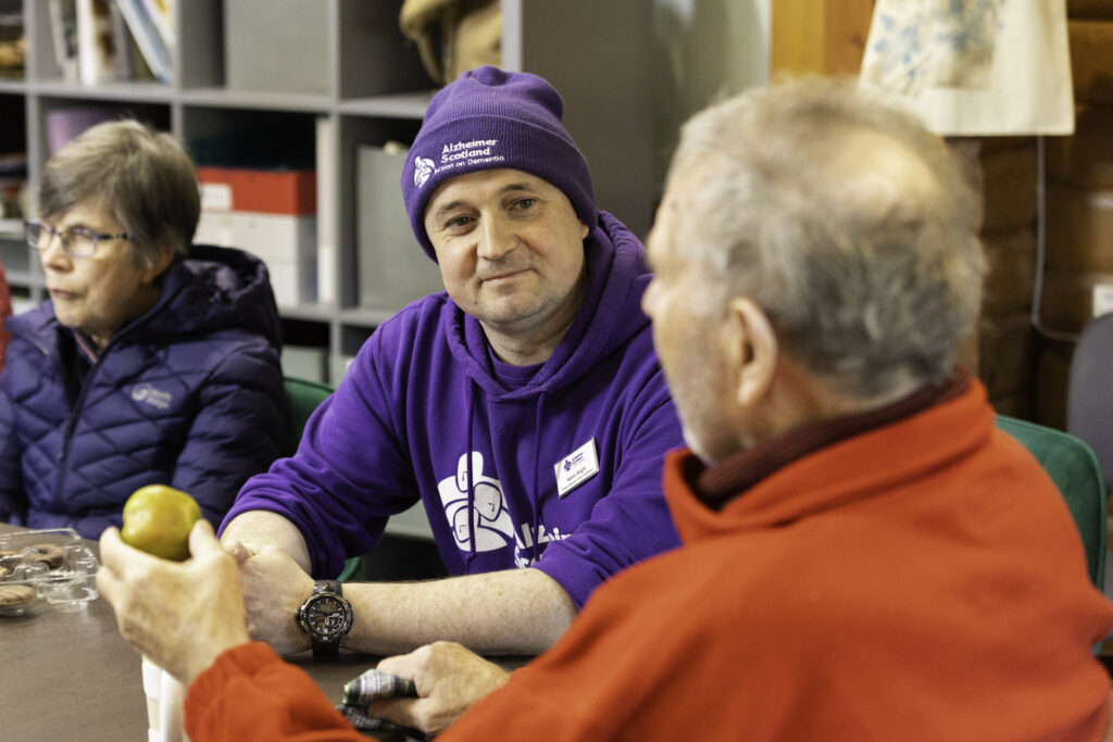 Alzheimer Scotland staff member leads community and support group