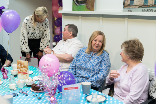 A group of people attending an Alzheimer Scotland cafe