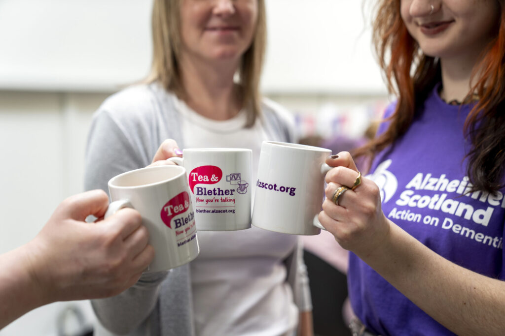 Cheers with Tea and belther branded mugs