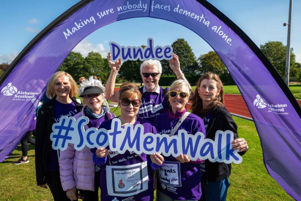 Group of supporters wearing purple at the Dundee Memory Walk