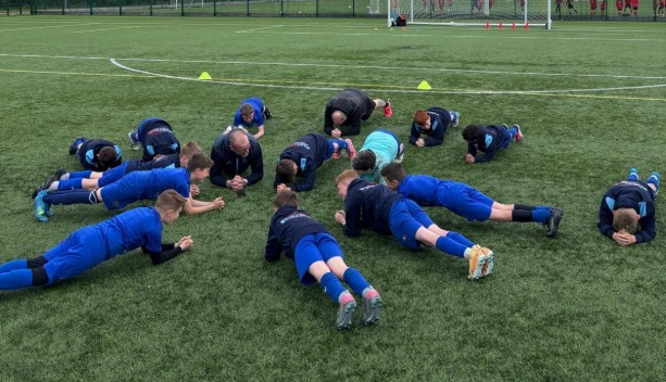 Planking on the football pitch